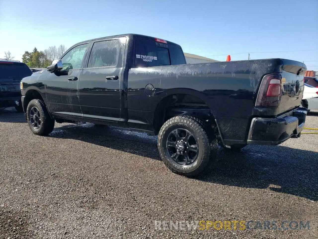 2 Photograph of a damaged car 3C6UR5DJ3LG248824 RAM 2500 2020