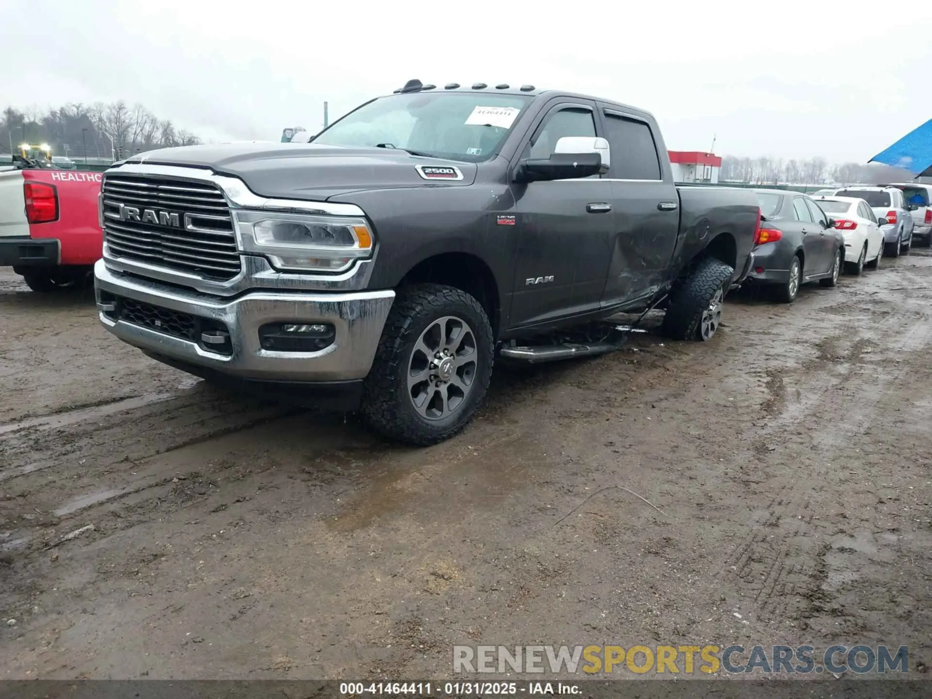 2 Photograph of a damaged car 3C6UR5DJ4LG283792 RAM 2500 2020