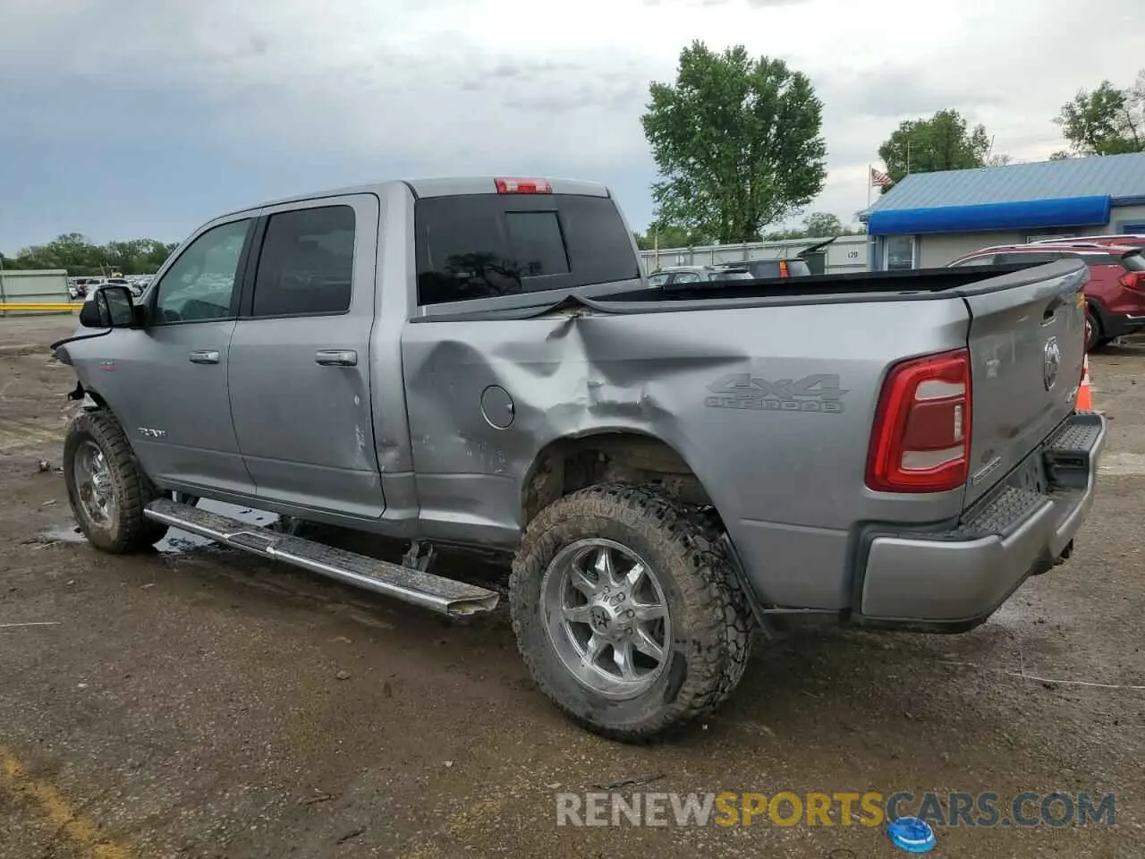 2 Photograph of a damaged car 3C6UR5DJ8LG106890 RAM 2500 2020