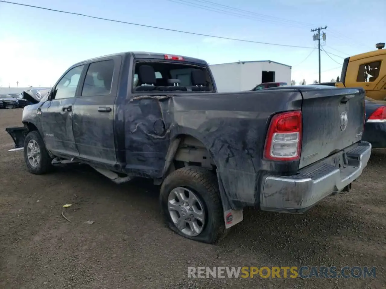 2 Photograph of a damaged car 3C6UR5DJ8LG225104 RAM 2500 2020