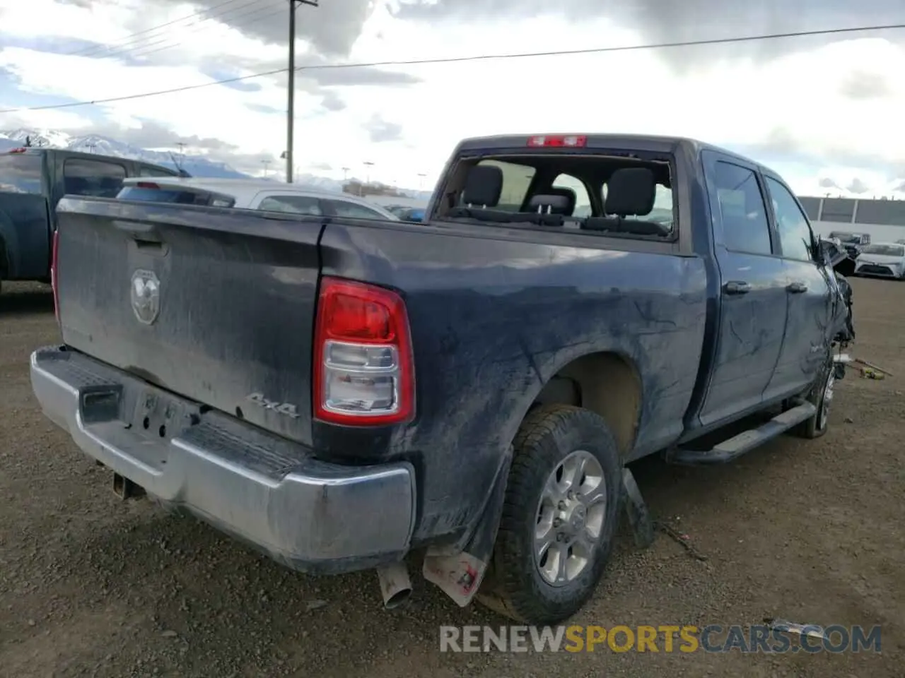 3 Photograph of a damaged car 3C6UR5DJ8LG225104 RAM 2500 2020