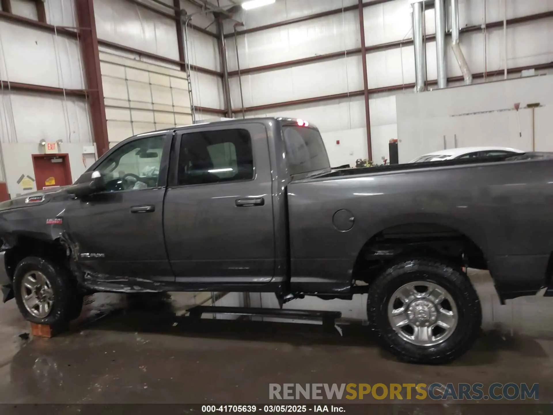 14 Photograph of a damaged car 3C6UR5DJ8LG298134 RAM 2500 2020