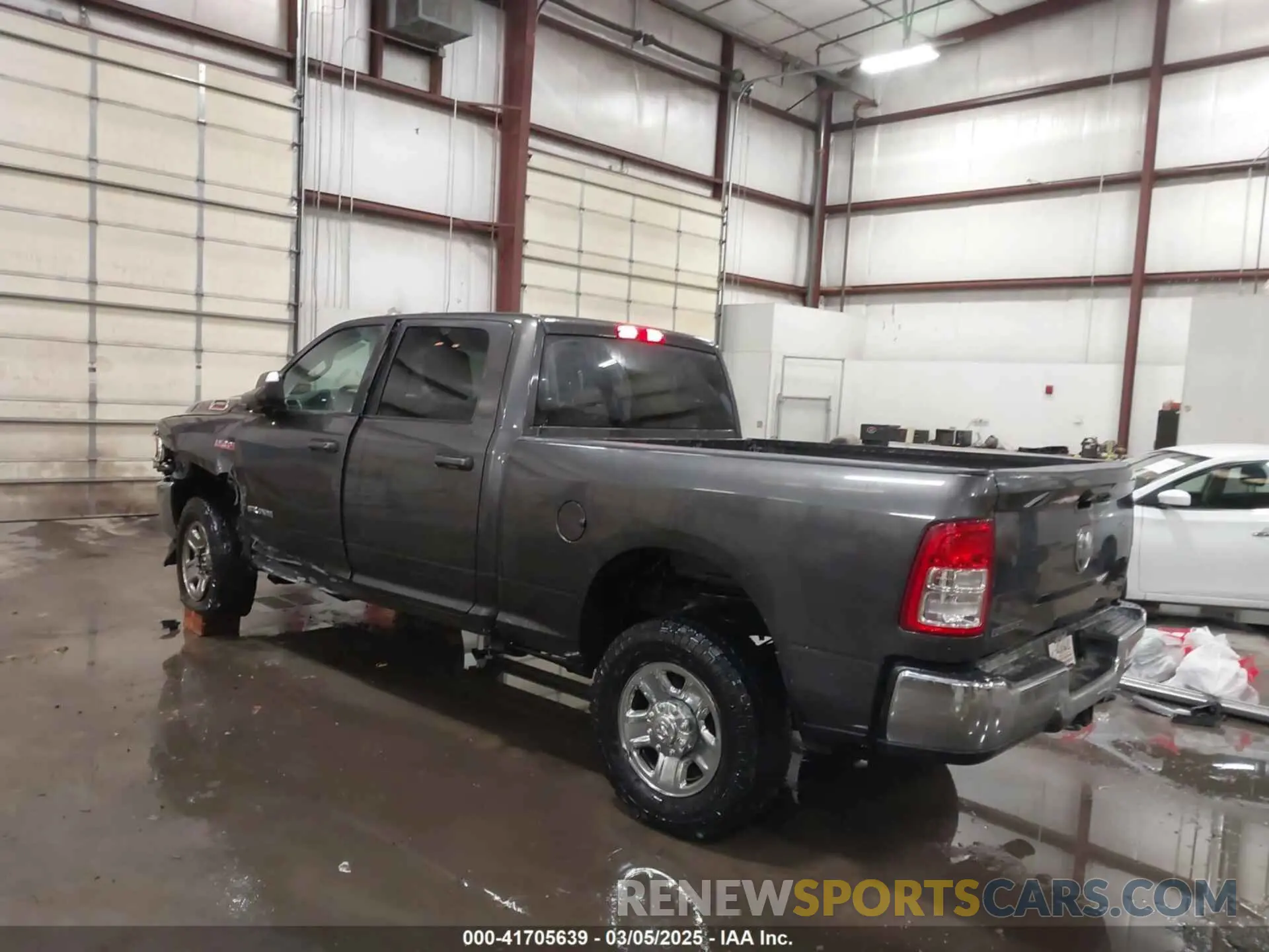 3 Photograph of a damaged car 3C6UR5DJ8LG298134 RAM 2500 2020