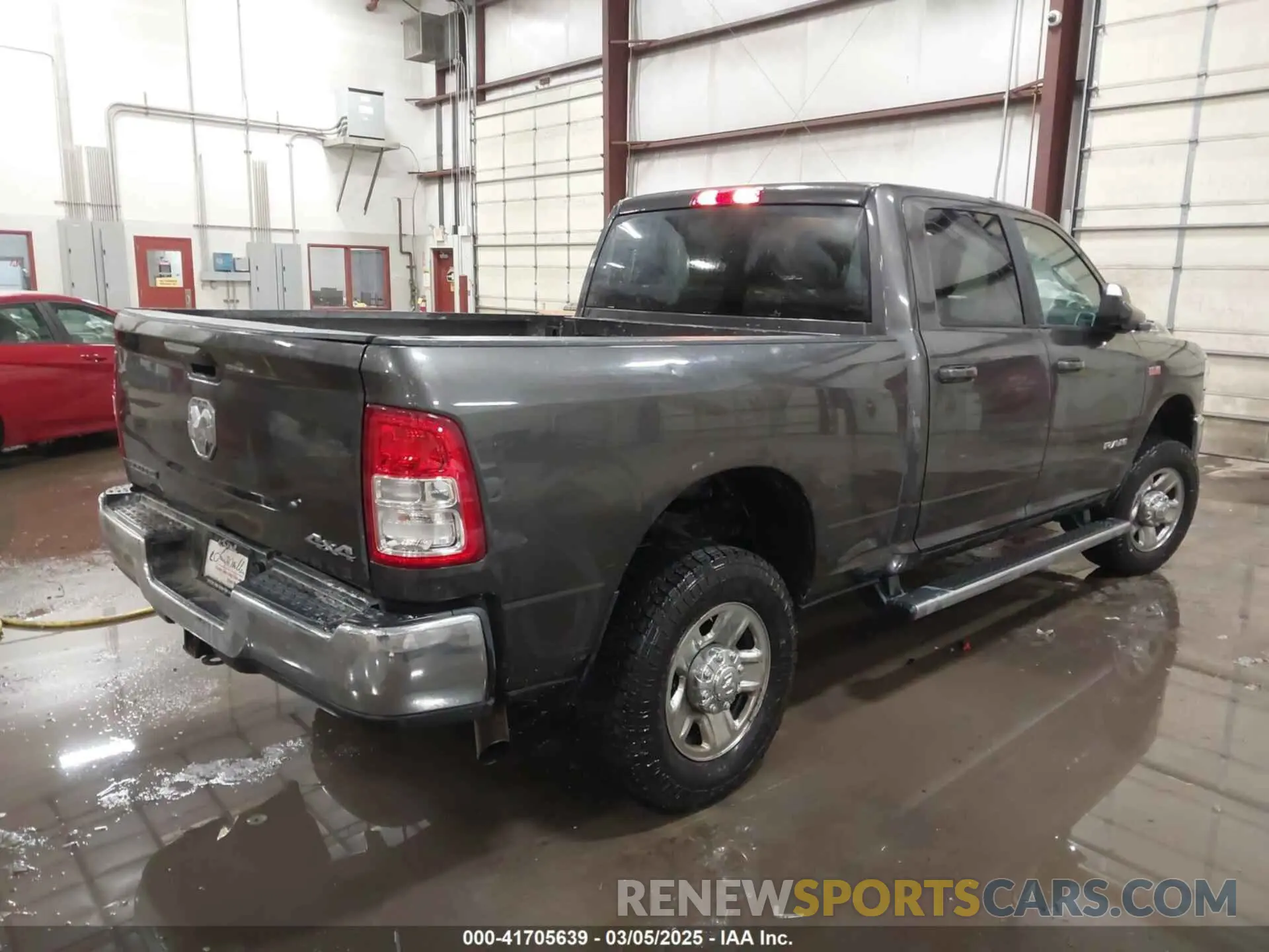 4 Photograph of a damaged car 3C6UR5DJ8LG298134 RAM 2500 2020