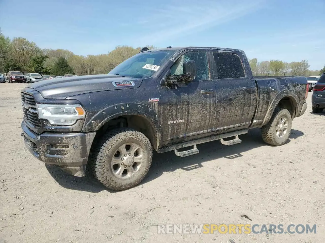 1 Photograph of a damaged car 3C6UR5DJXLG112836 RAM 2500 2020
