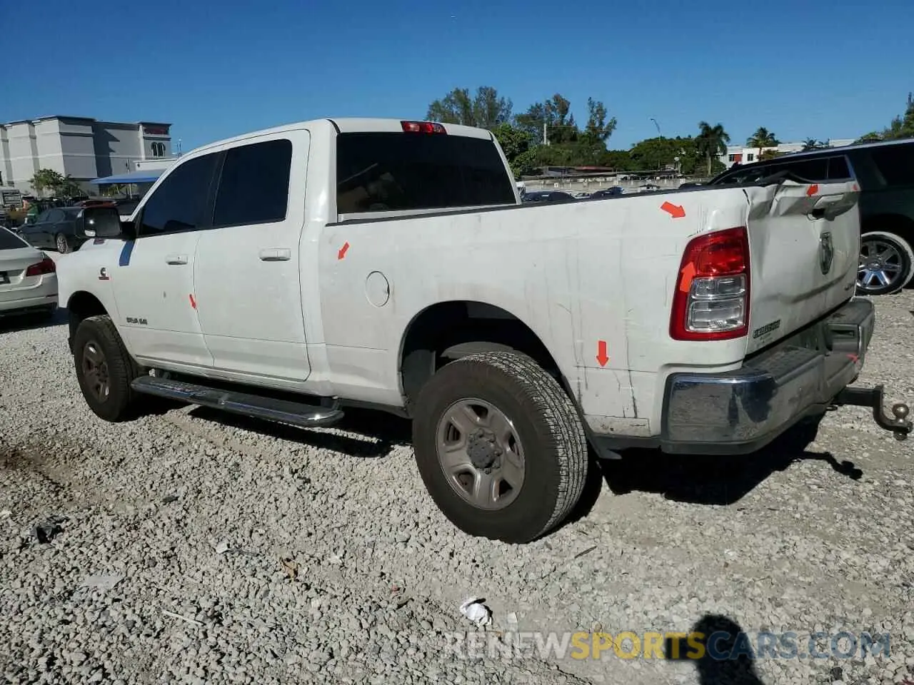 2 Photograph of a damaged car 3C6UR5DL0LG132708 RAM 2500 2020
