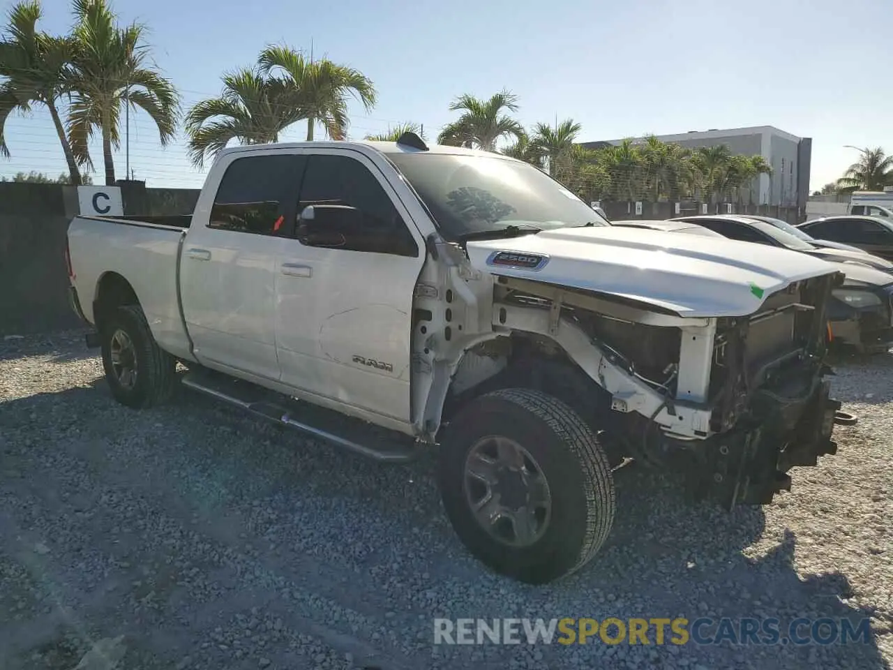 4 Photograph of a damaged car 3C6UR5DL0LG132708 RAM 2500 2020