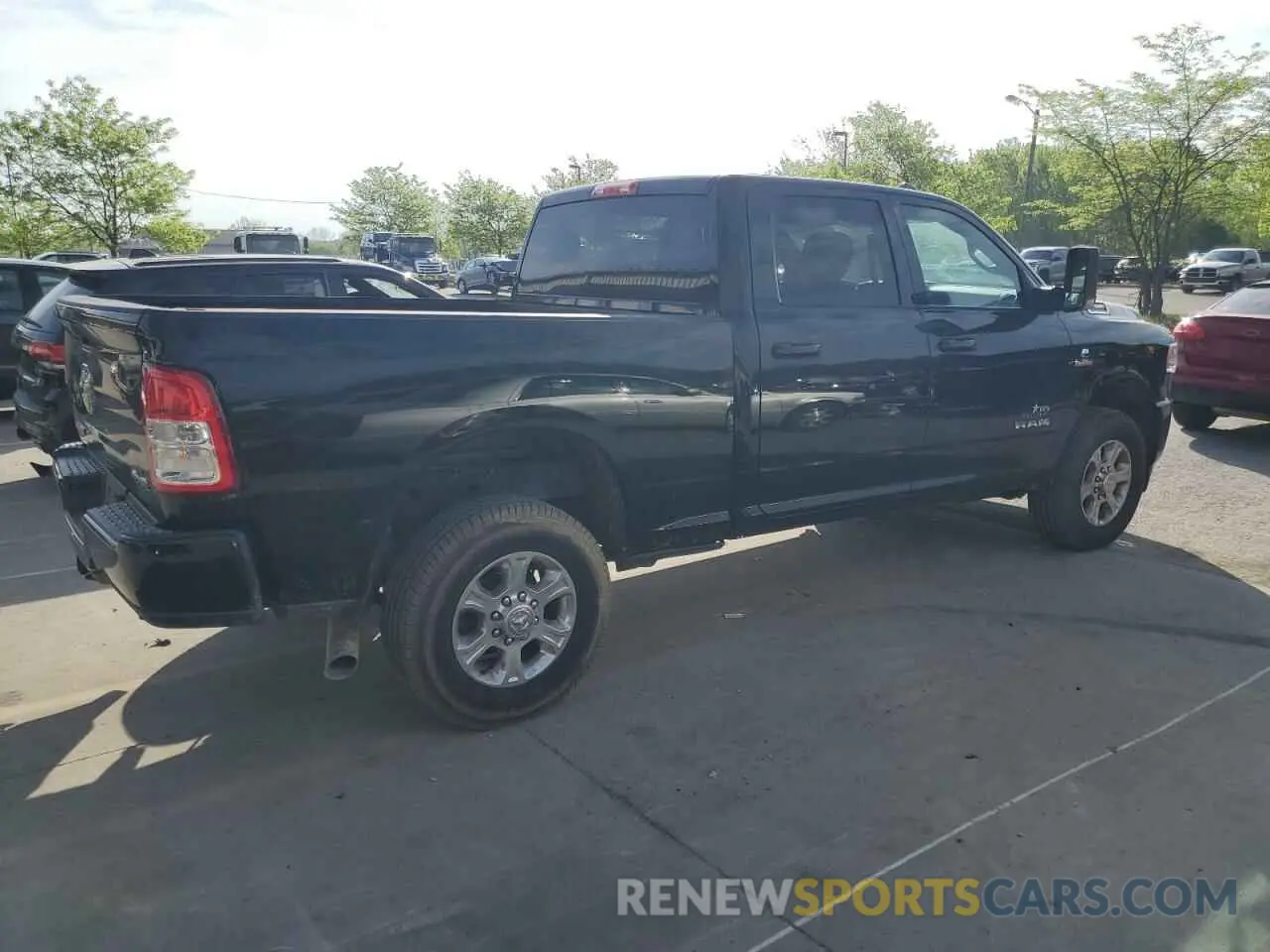 3 Photograph of a damaged car 3C6UR5DL1LG115318 RAM 2500 2020