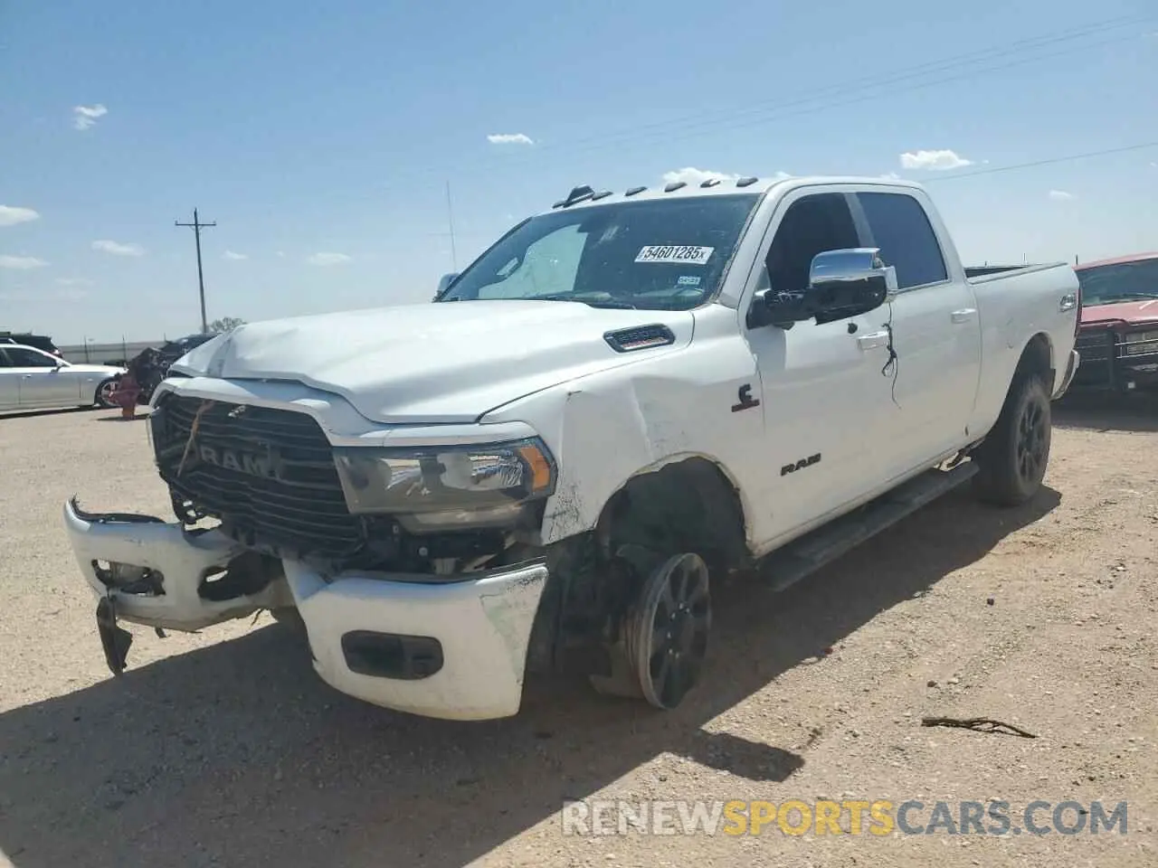 1 Photograph of a damaged car 3C6UR5DL2LG112508 RAM 2500 2020