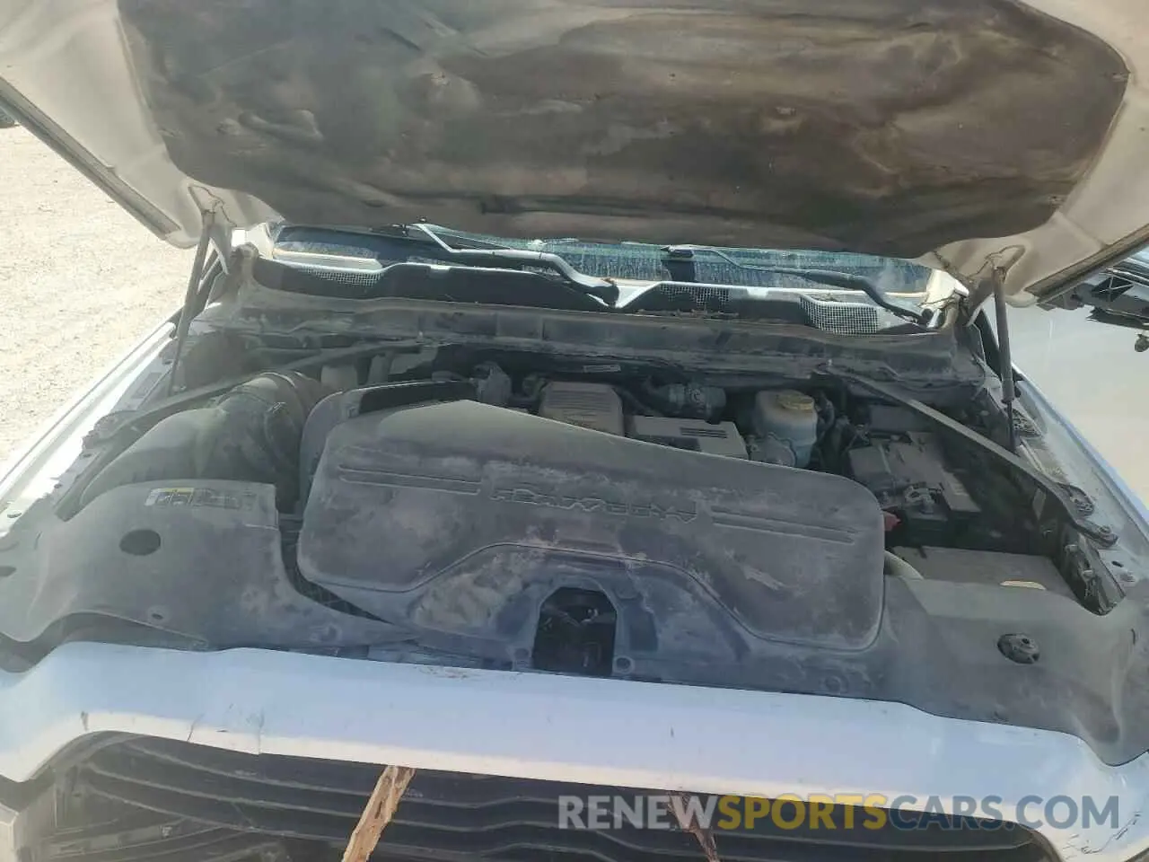 11 Photograph of a damaged car 3C6UR5DL2LG112508 RAM 2500 2020