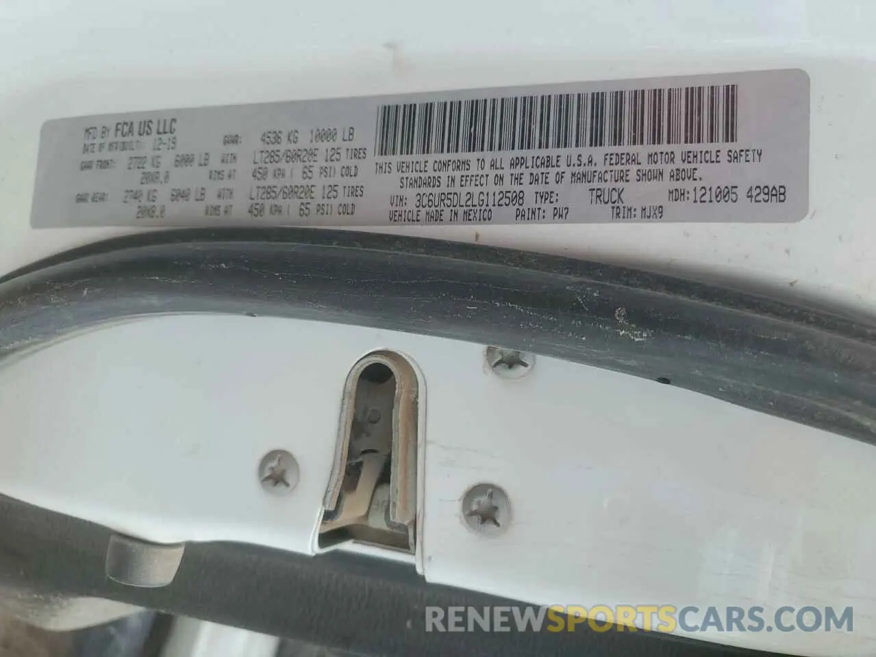 12 Photograph of a damaged car 3C6UR5DL2LG112508 RAM 2500 2020