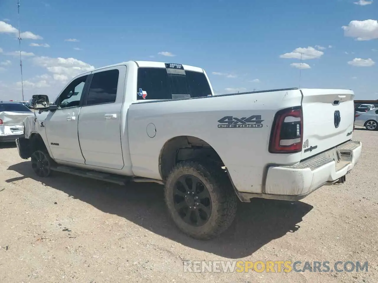 2 Photograph of a damaged car 3C6UR5DL2LG112508 RAM 2500 2020