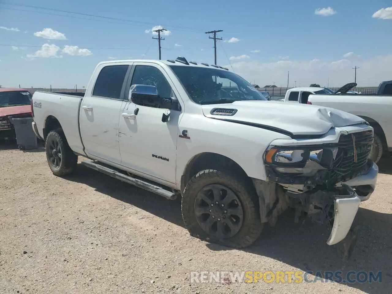 4 Photograph of a damaged car 3C6UR5DL2LG112508 RAM 2500 2020