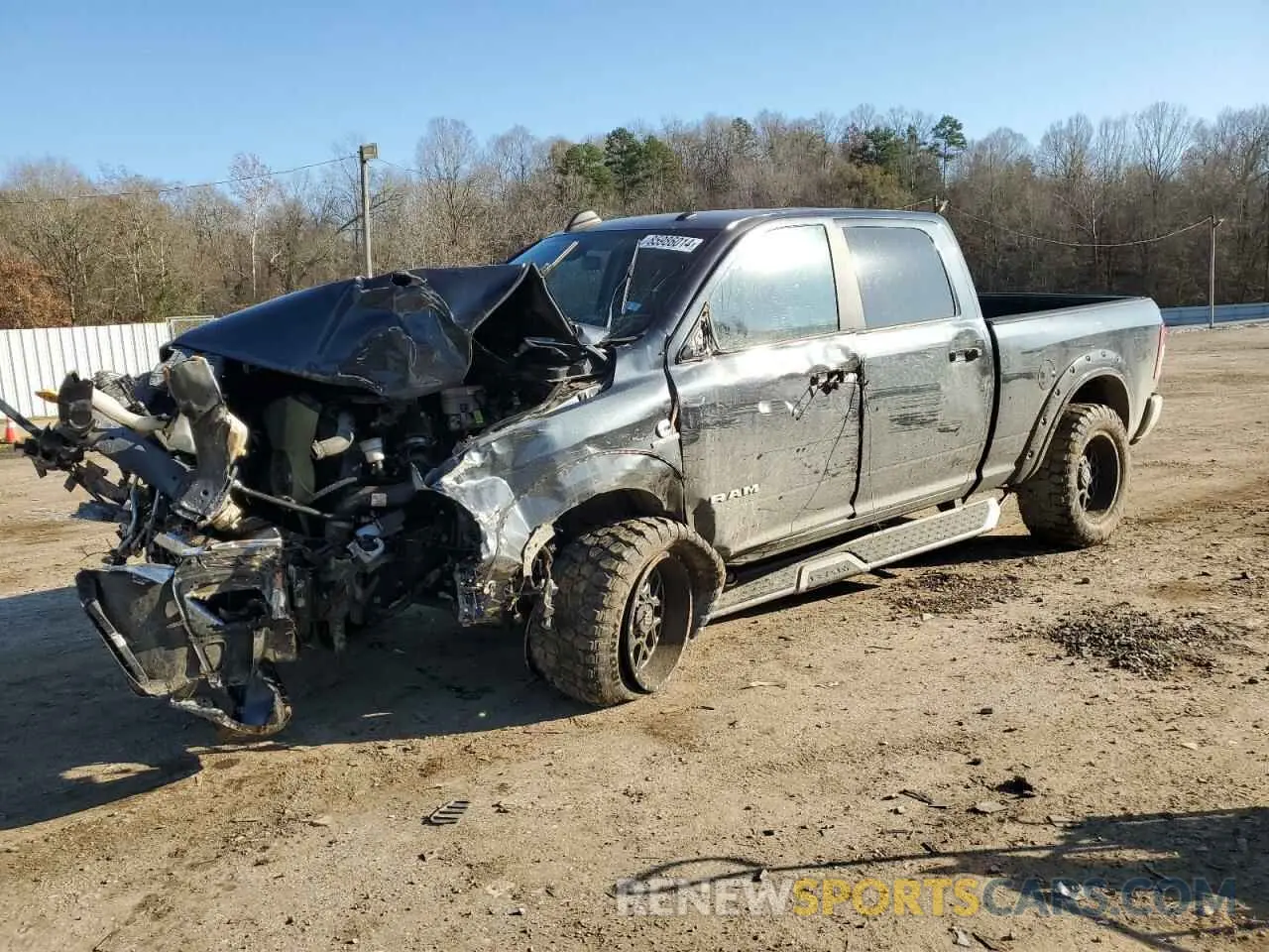 1 Photograph of a damaged car 3C6UR5DL2LG156072 RAM 2500 2020