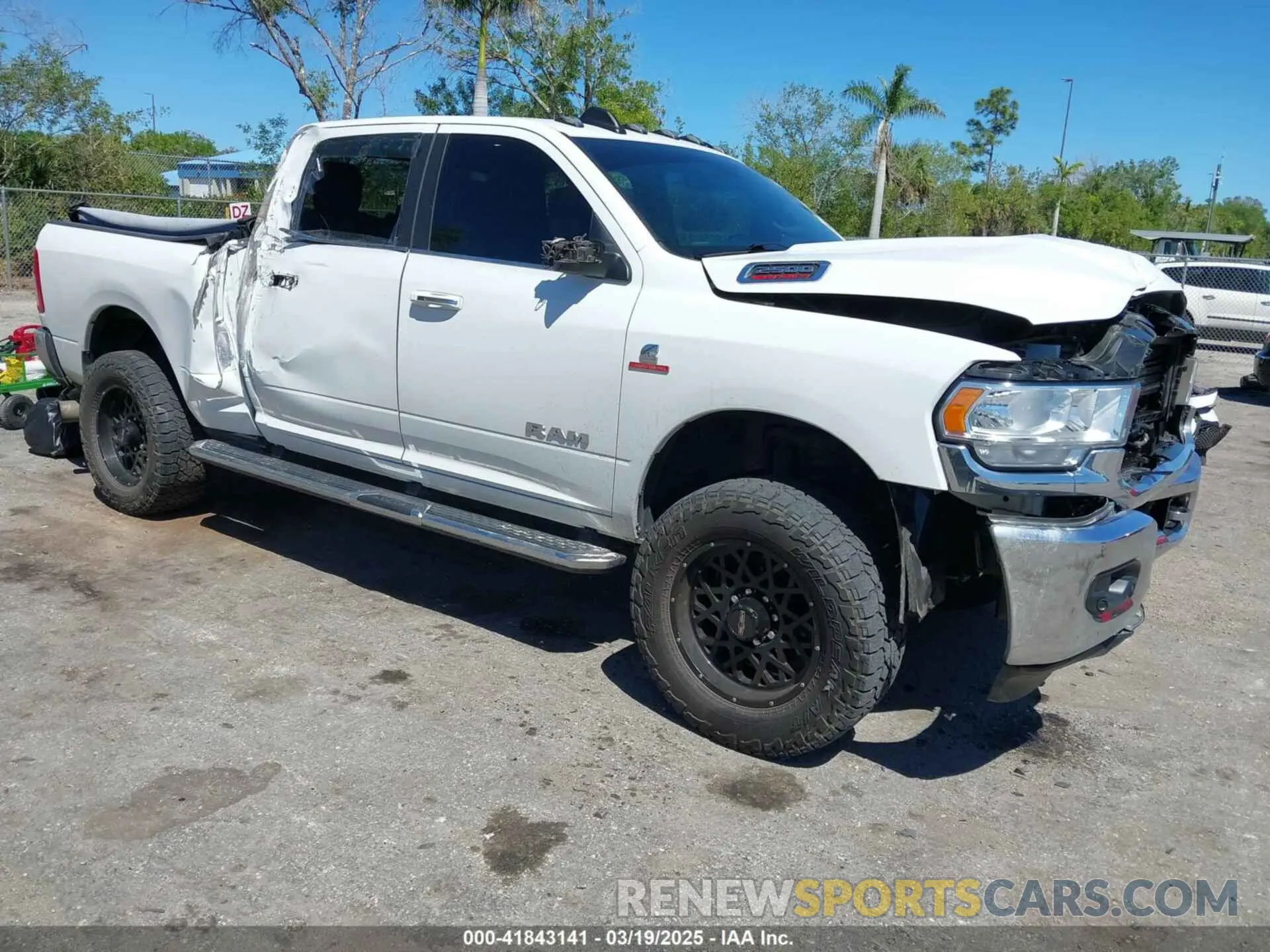 1 Photograph of a damaged car 3C6UR5DL3LG309803 RAM 2500 2020