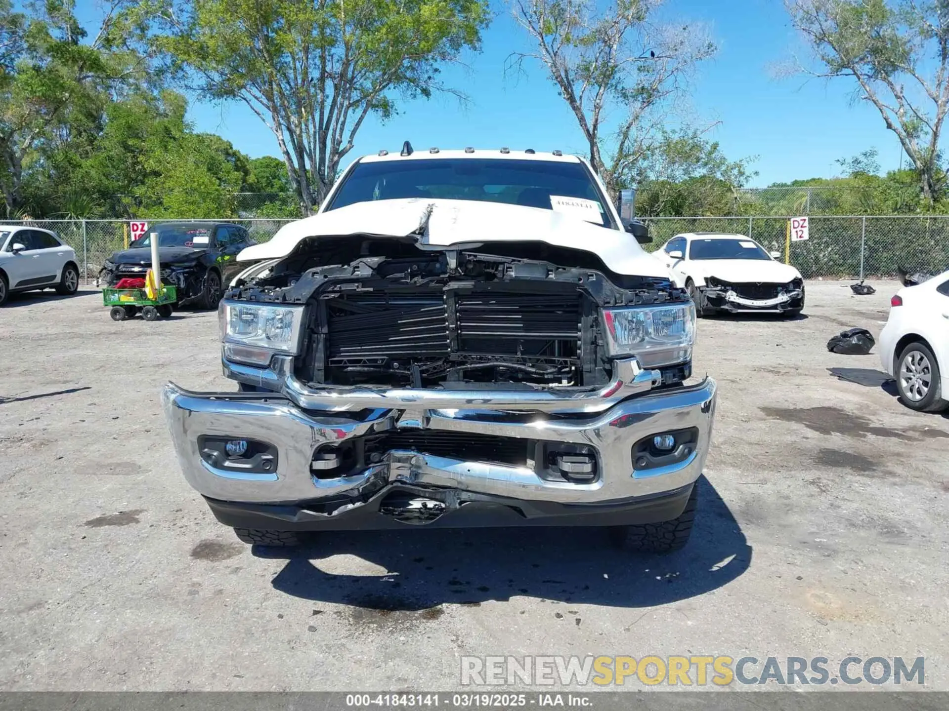 12 Photograph of a damaged car 3C6UR5DL3LG309803 RAM 2500 2020