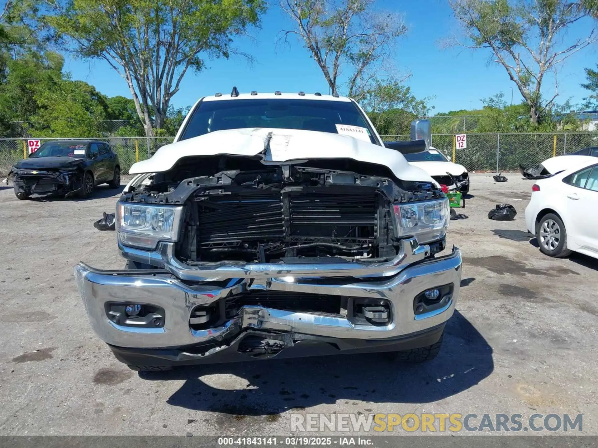 6 Photograph of a damaged car 3C6UR5DL3LG309803 RAM 2500 2020