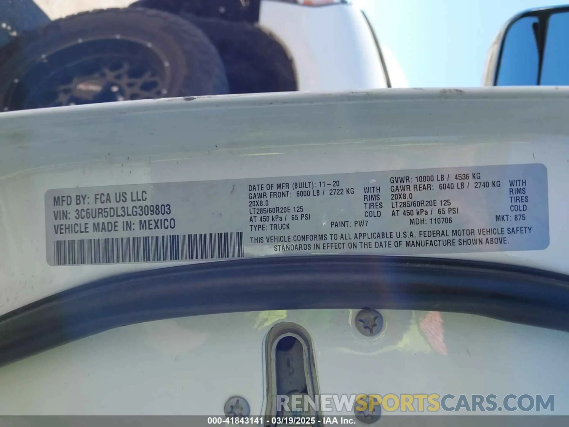 9 Photograph of a damaged car 3C6UR5DL3LG309803 RAM 2500 2020