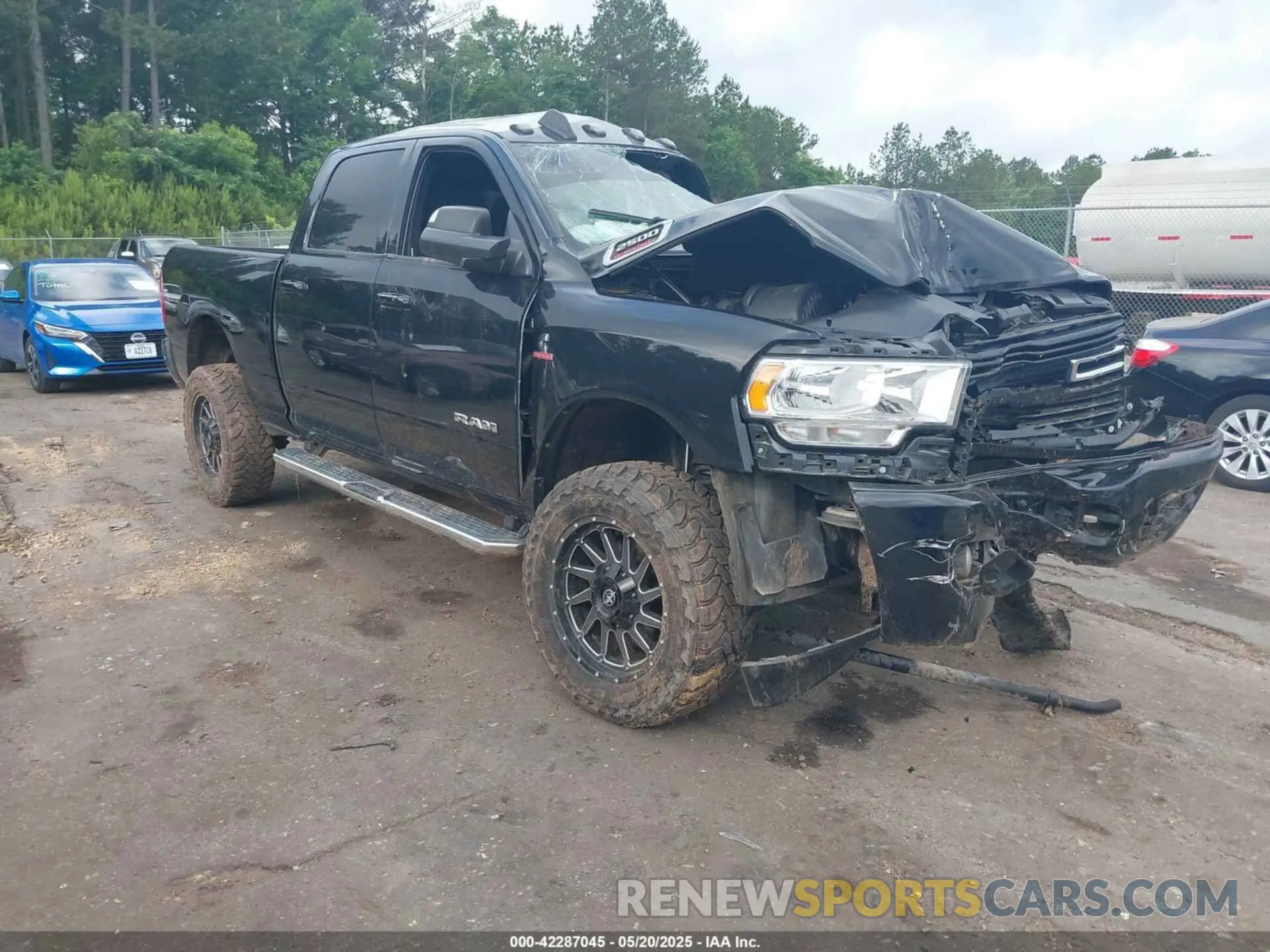 1 Photograph of a damaged car 3C6UR5DL4LG115295 RAM 2500 2020