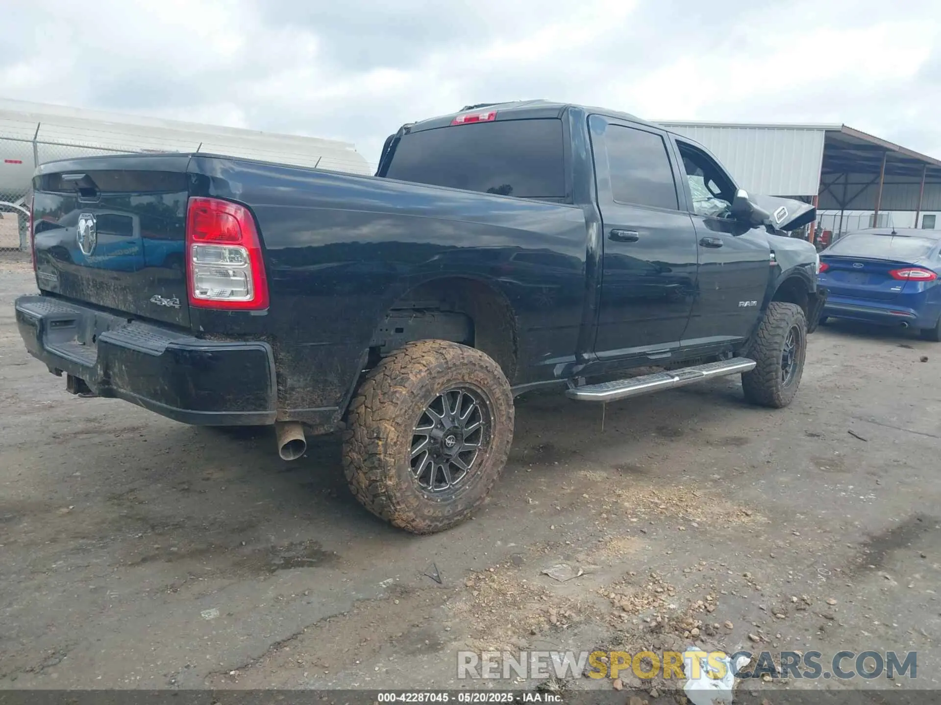 4 Photograph of a damaged car 3C6UR5DL4LG115295 RAM 2500 2020