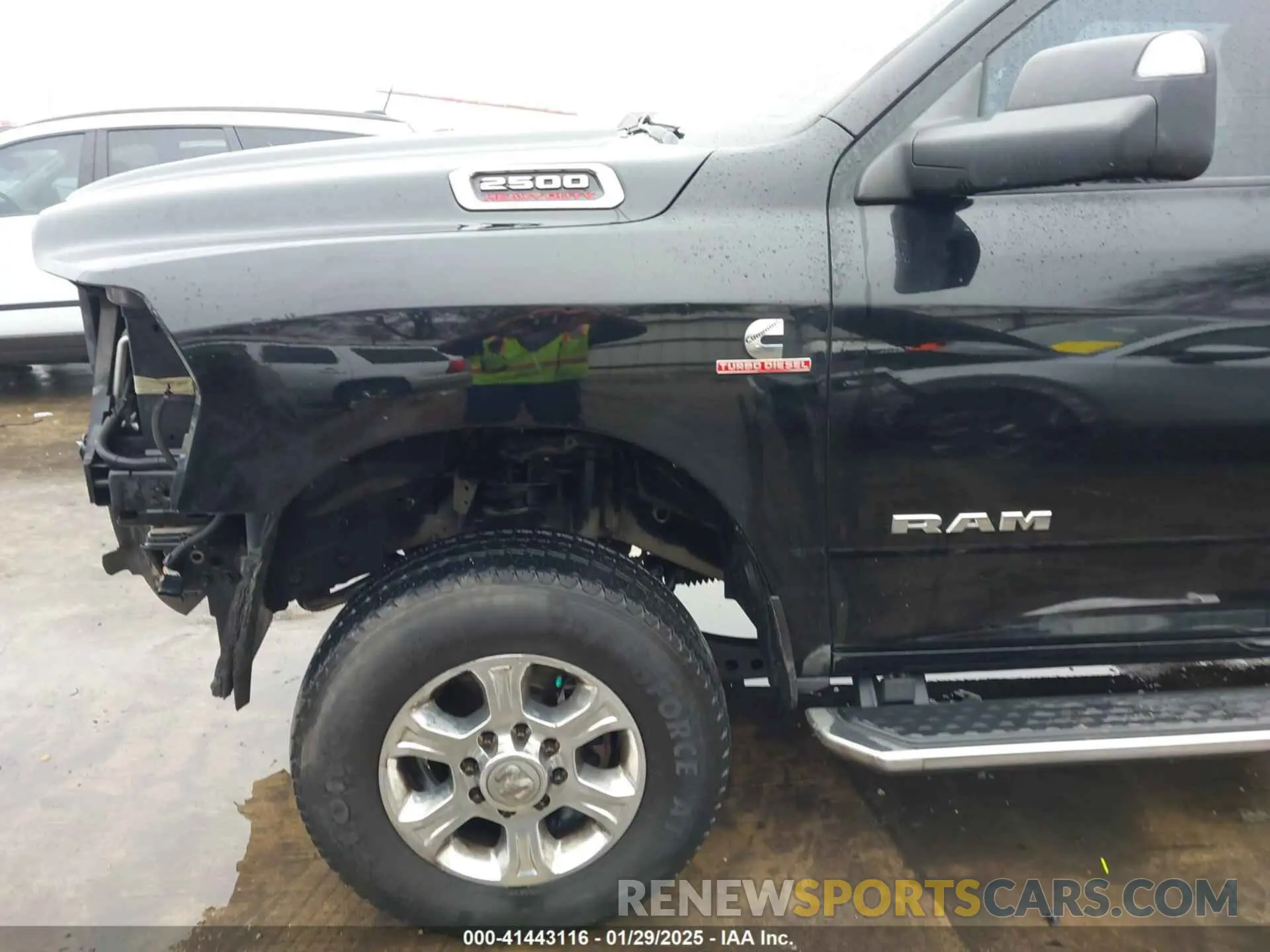 19 Photograph of a damaged car 3C6UR5DL4LG115300 RAM 2500 2020