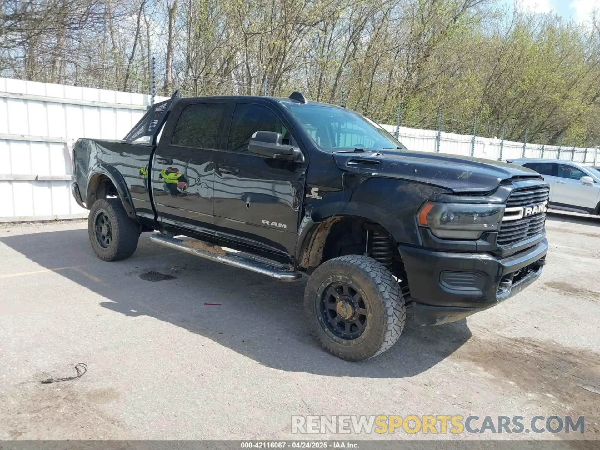 1 Photograph of a damaged car 3C6UR5DL6LG116741 RAM 2500 2020