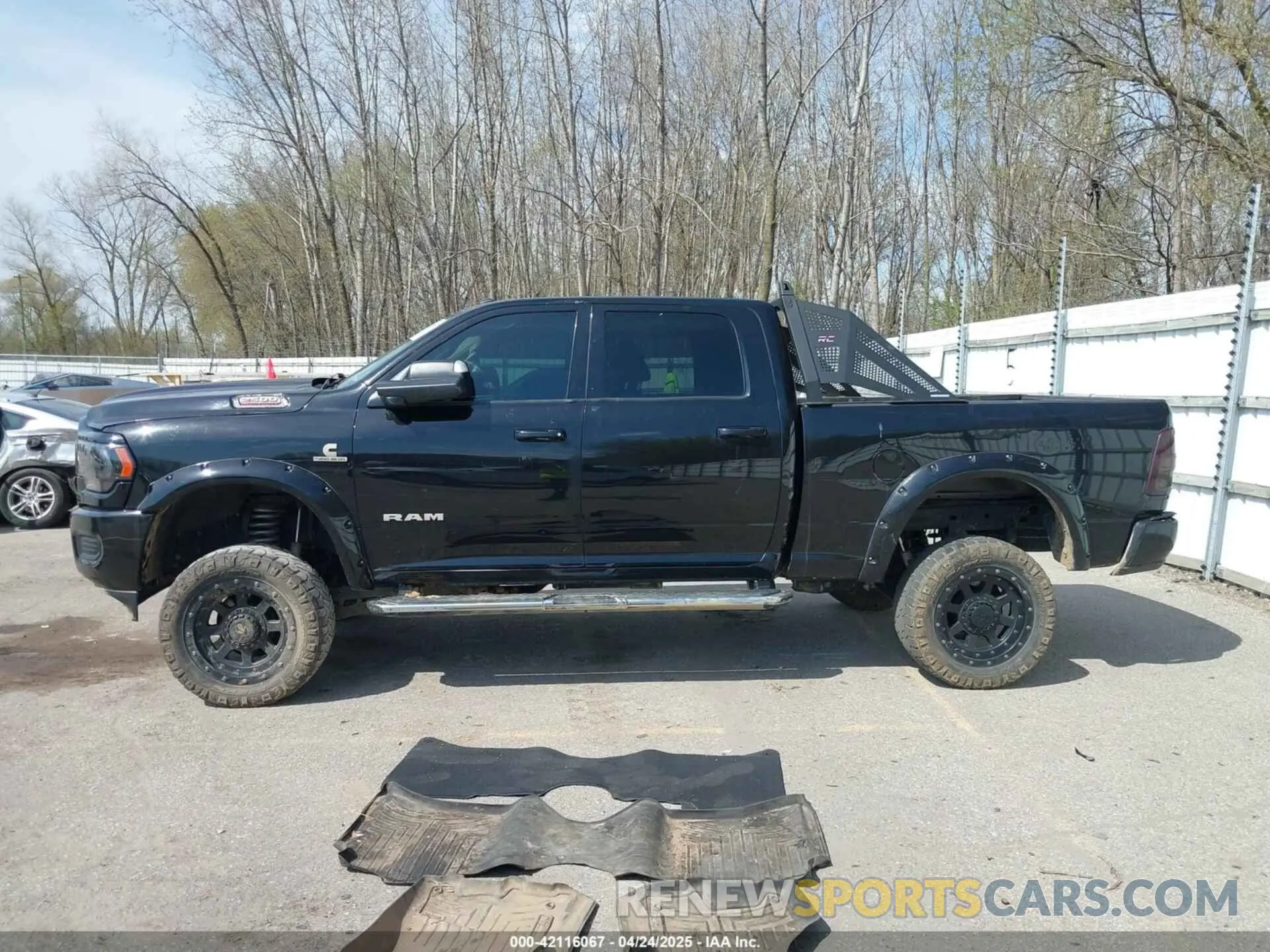 14 Photograph of a damaged car 3C6UR5DL6LG116741 RAM 2500 2020