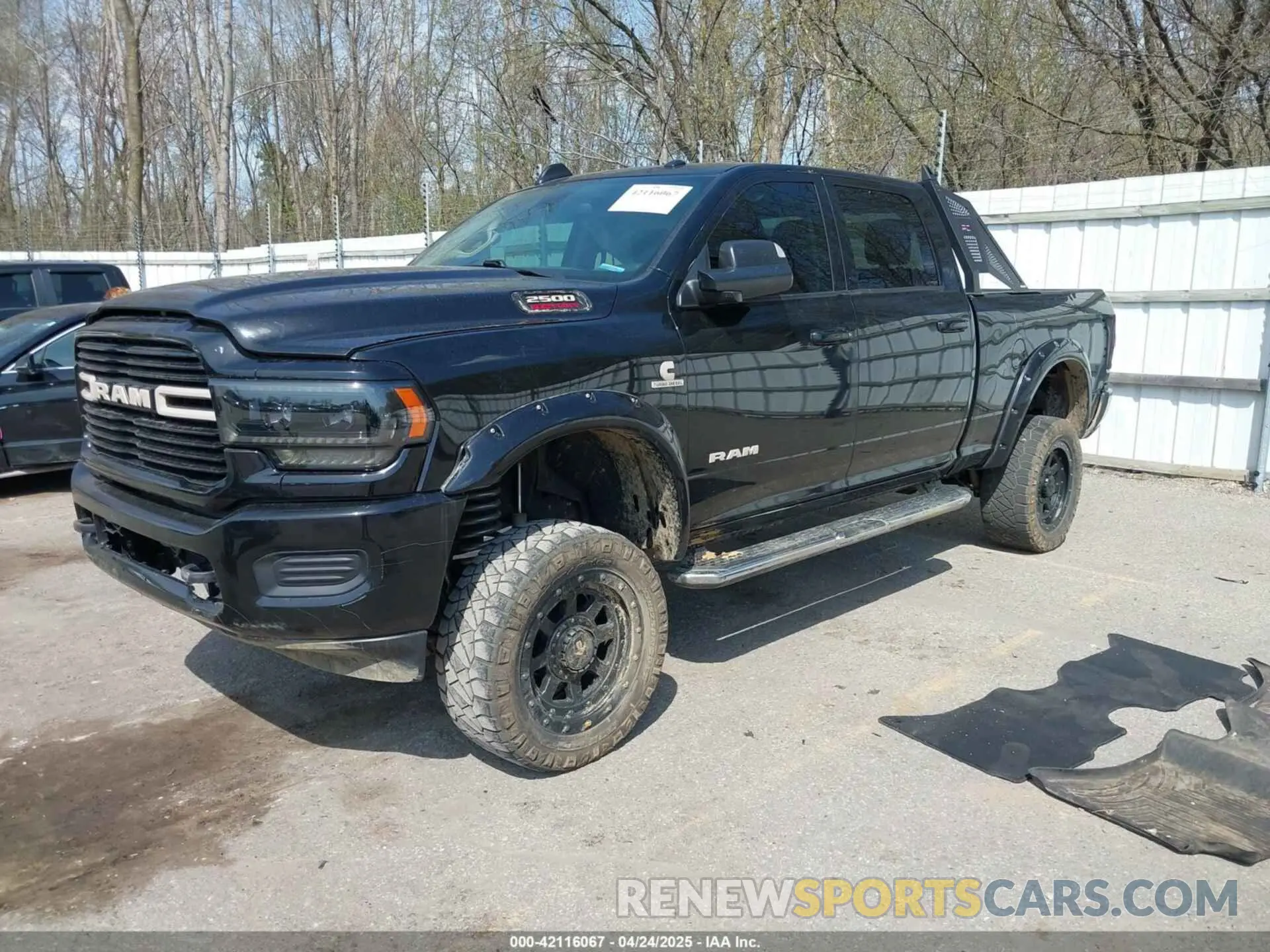 2 Photograph of a damaged car 3C6UR5DL6LG116741 RAM 2500 2020