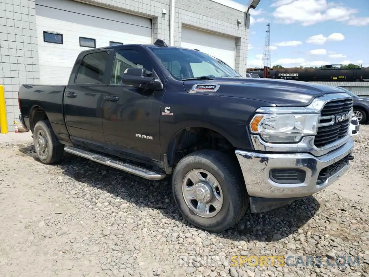 4 Photograph of a damaged car 3C6UR5DL7LG141230 RAM 2500 2020