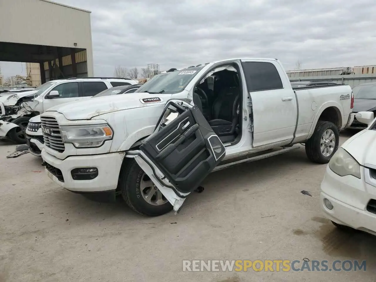 1 Photograph of a damaged car 3C6UR5FL1LG235410 RAM 2500 2020