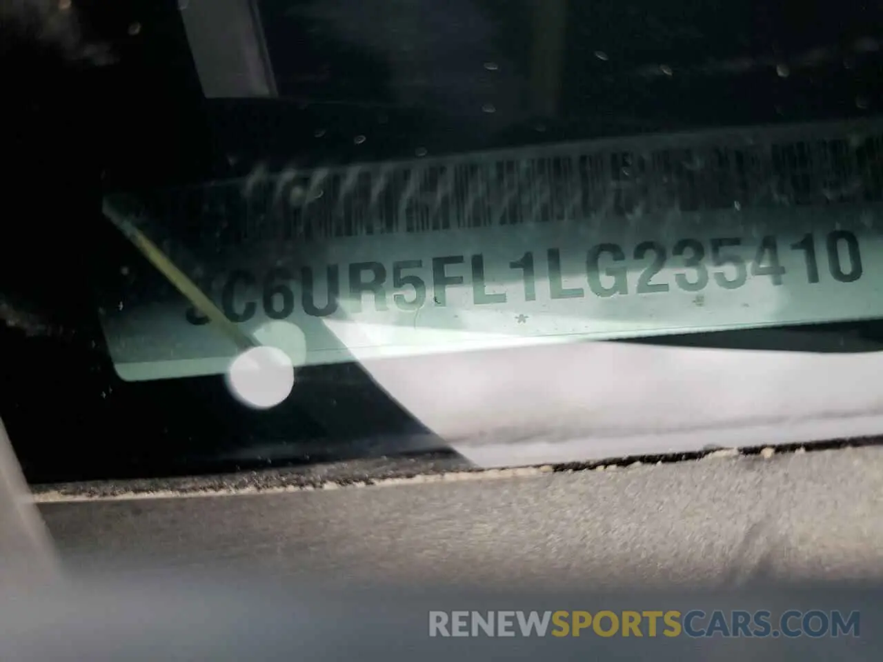 14 Photograph of a damaged car 3C6UR5FL1LG235410 RAM 2500 2020
