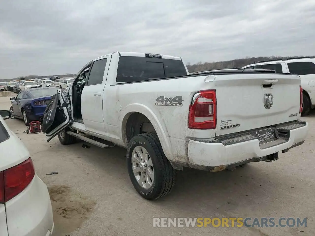 2 Photograph of a damaged car 3C6UR5FL1LG235410 RAM 2500 2020