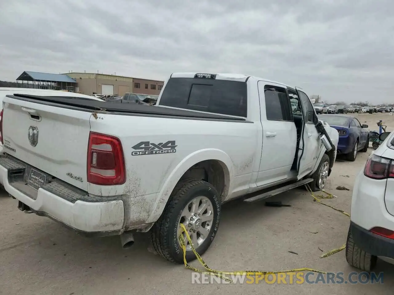 3 Photograph of a damaged car 3C6UR5FL1LG235410 RAM 2500 2020