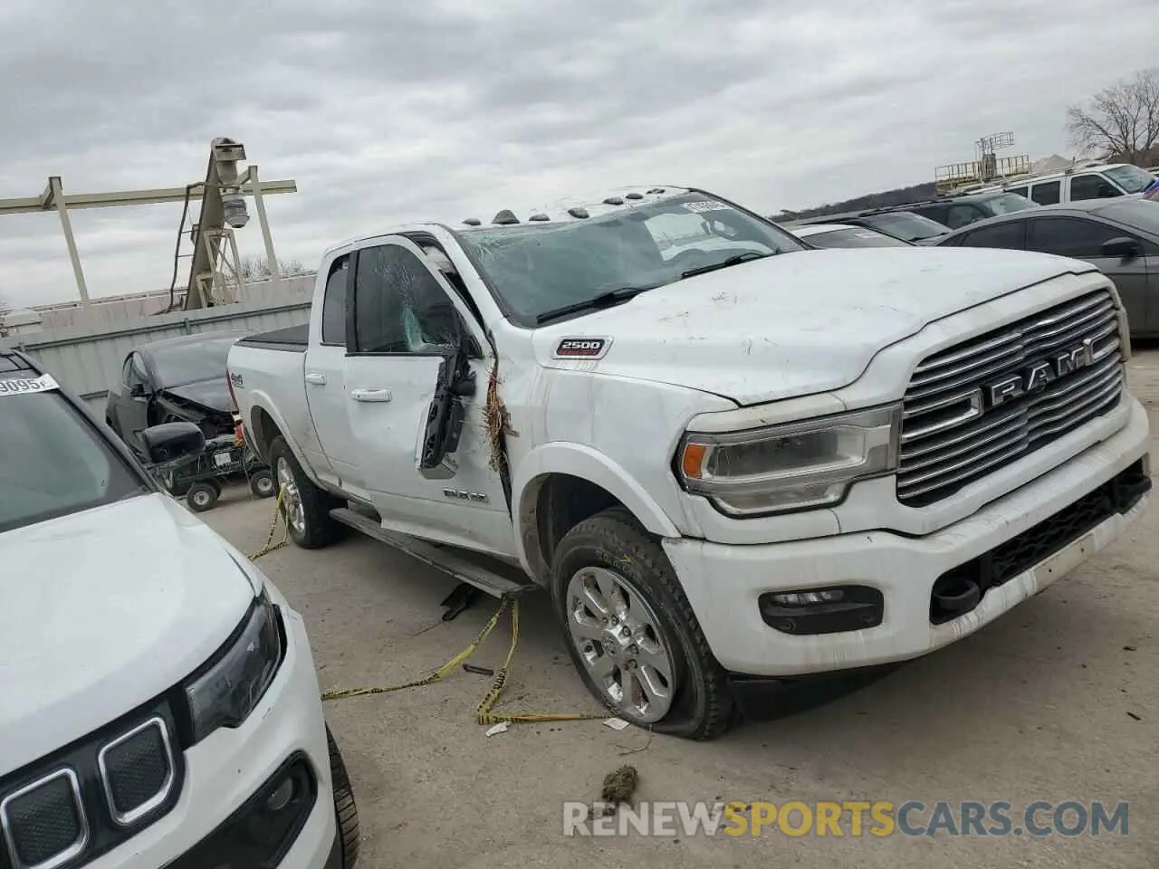 4 Photograph of a damaged car 3C6UR5FL1LG235410 RAM 2500 2020