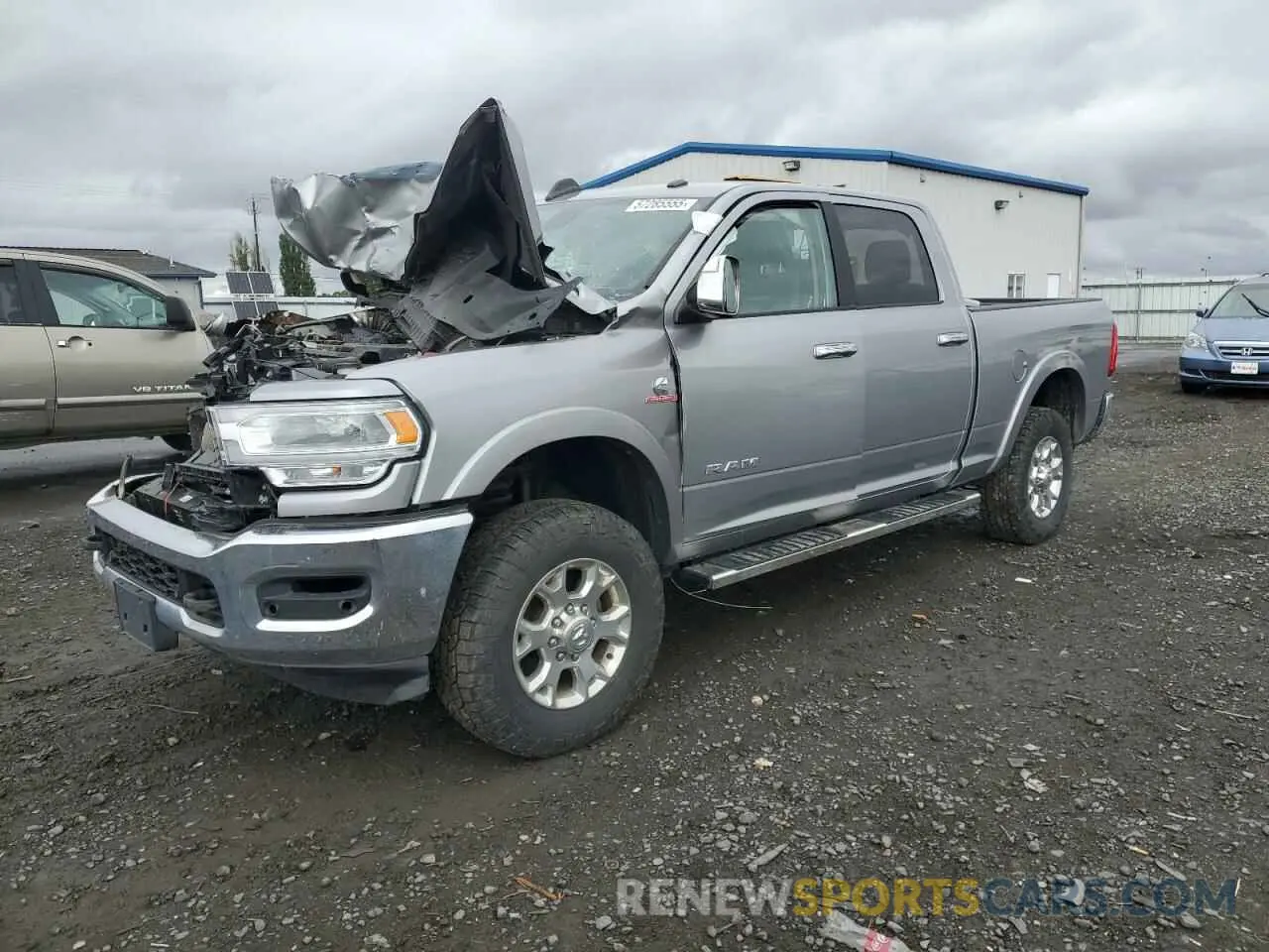 1 Photograph of a damaged car 3C6UR5FL4LG119330 RAM 2500 2020