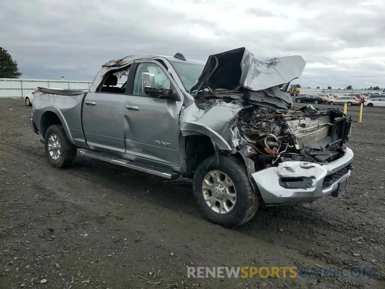4 Photograph of a damaged car 3C6UR5FL4LG119330 RAM 2500 2020