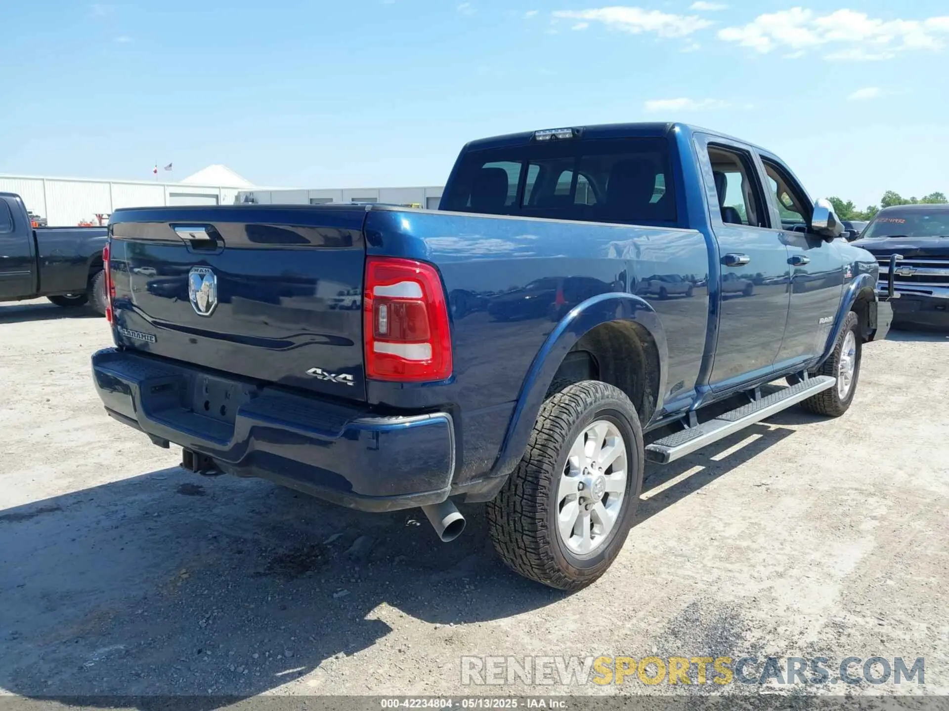 4 Photograph of a damaged car 3C6UR5FL4LG192682 RAM 2500 2020
