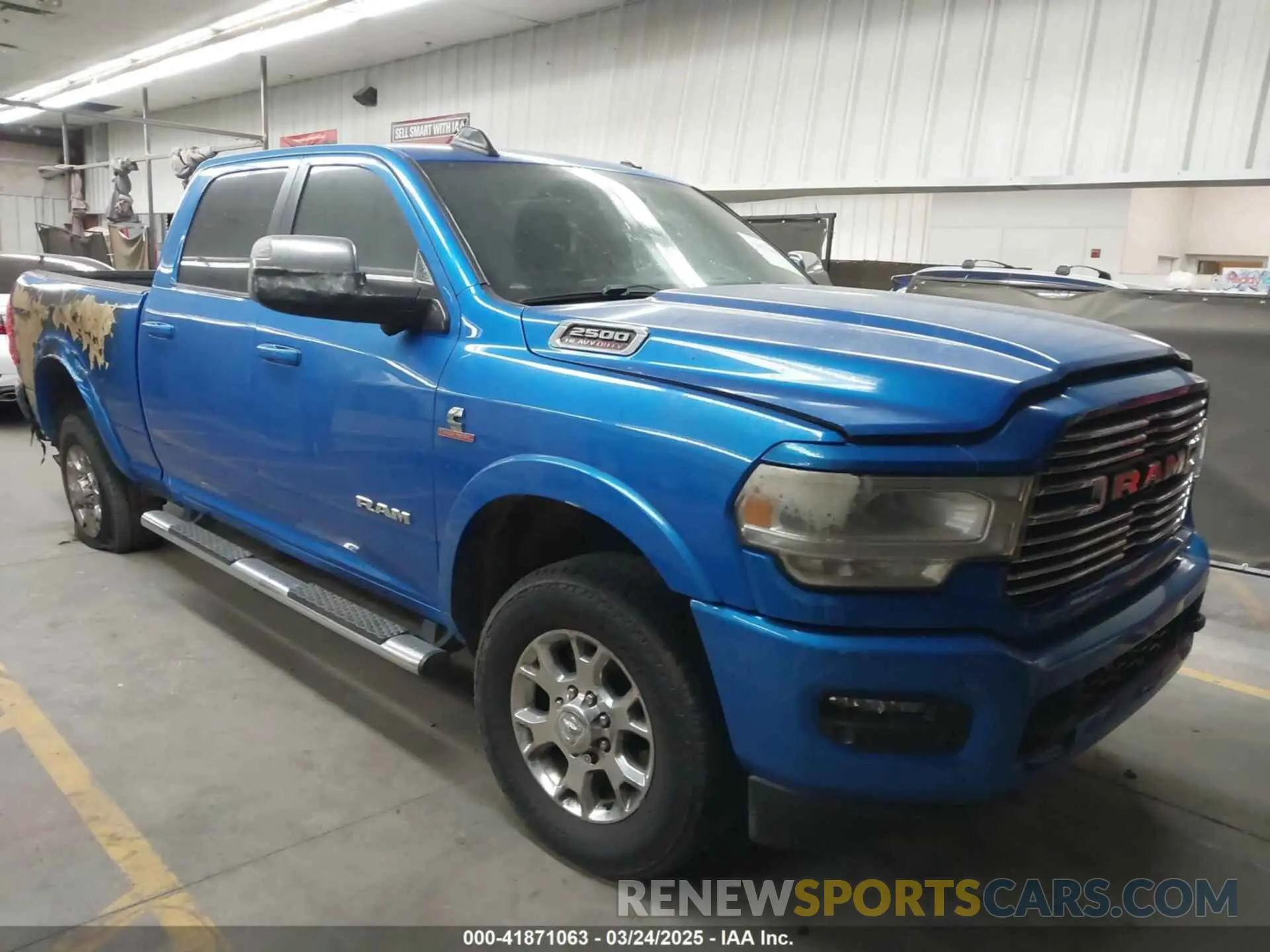 1 Photograph of a damaged car 3C6UR5FL4LG208430 RAM 2500 2020