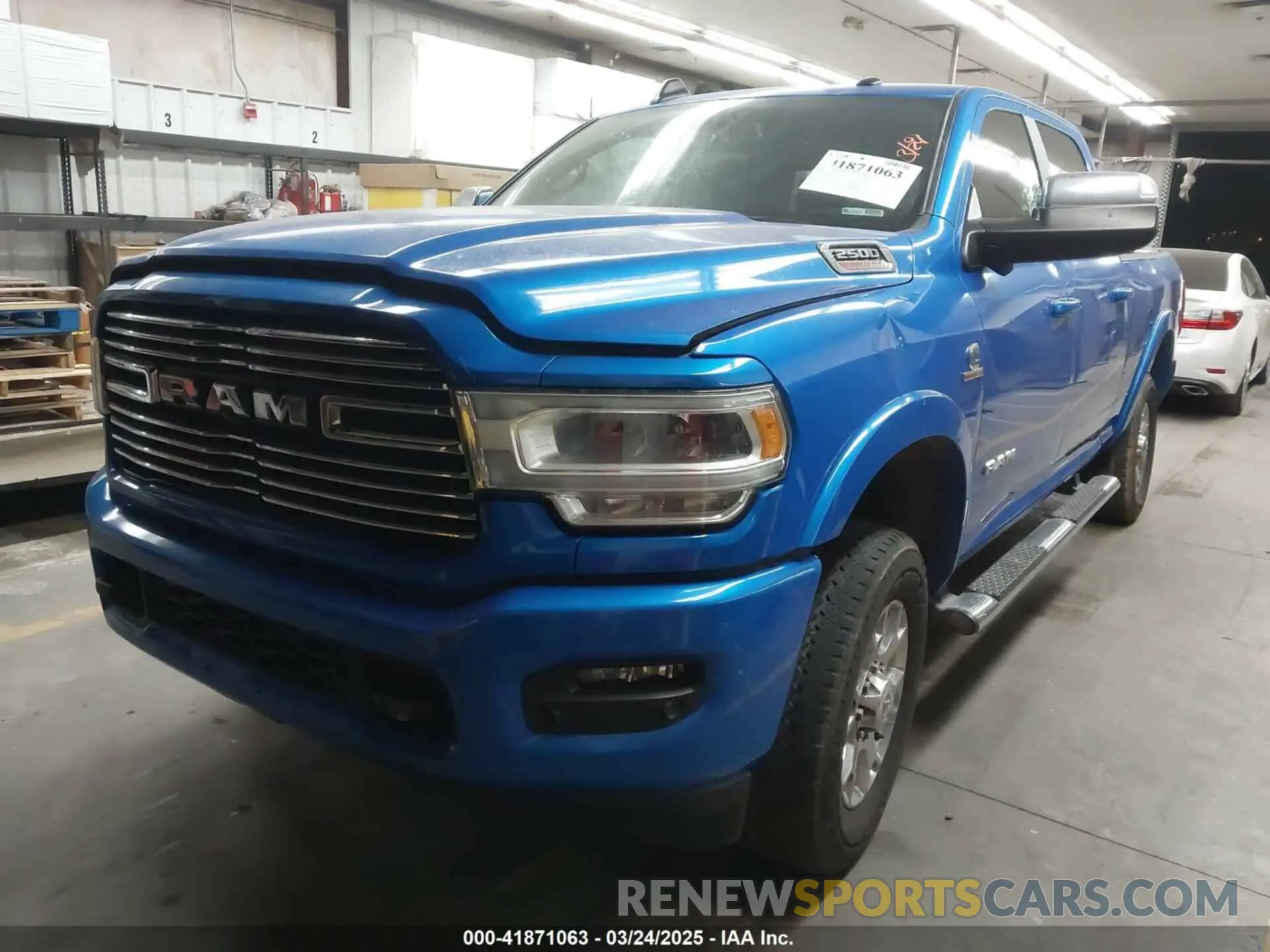 2 Photograph of a damaged car 3C6UR5FL4LG208430 RAM 2500 2020