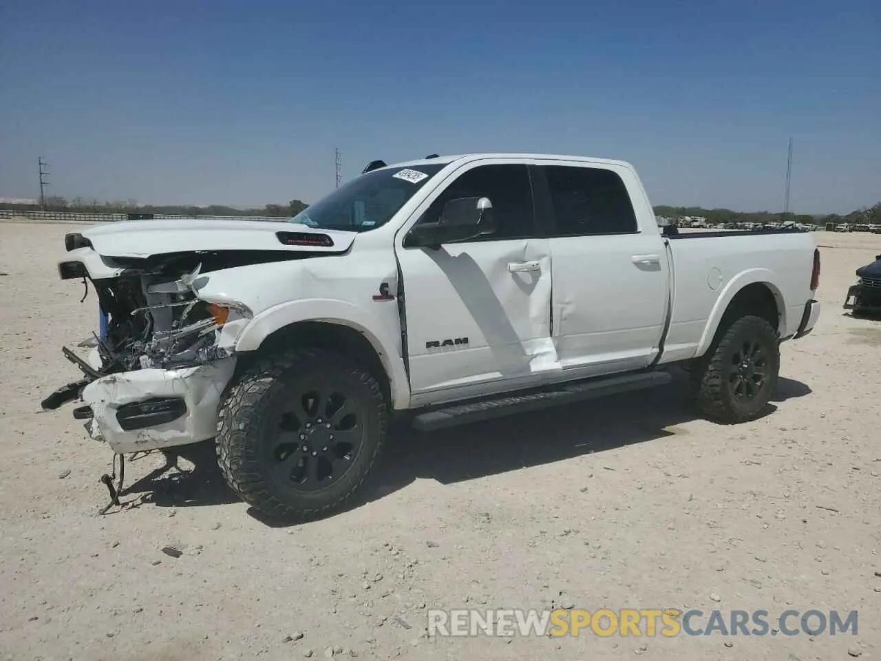 1 Photograph of a damaged car 3C6UR5FL4LG251701 RAM 2500 2020