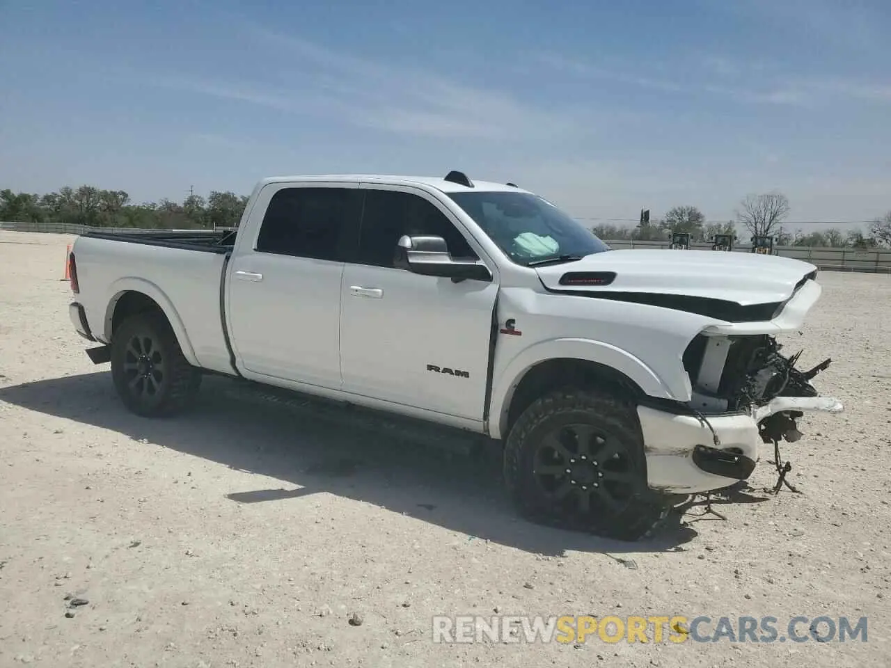 4 Photograph of a damaged car 3C6UR5FL4LG251701 RAM 2500 2020