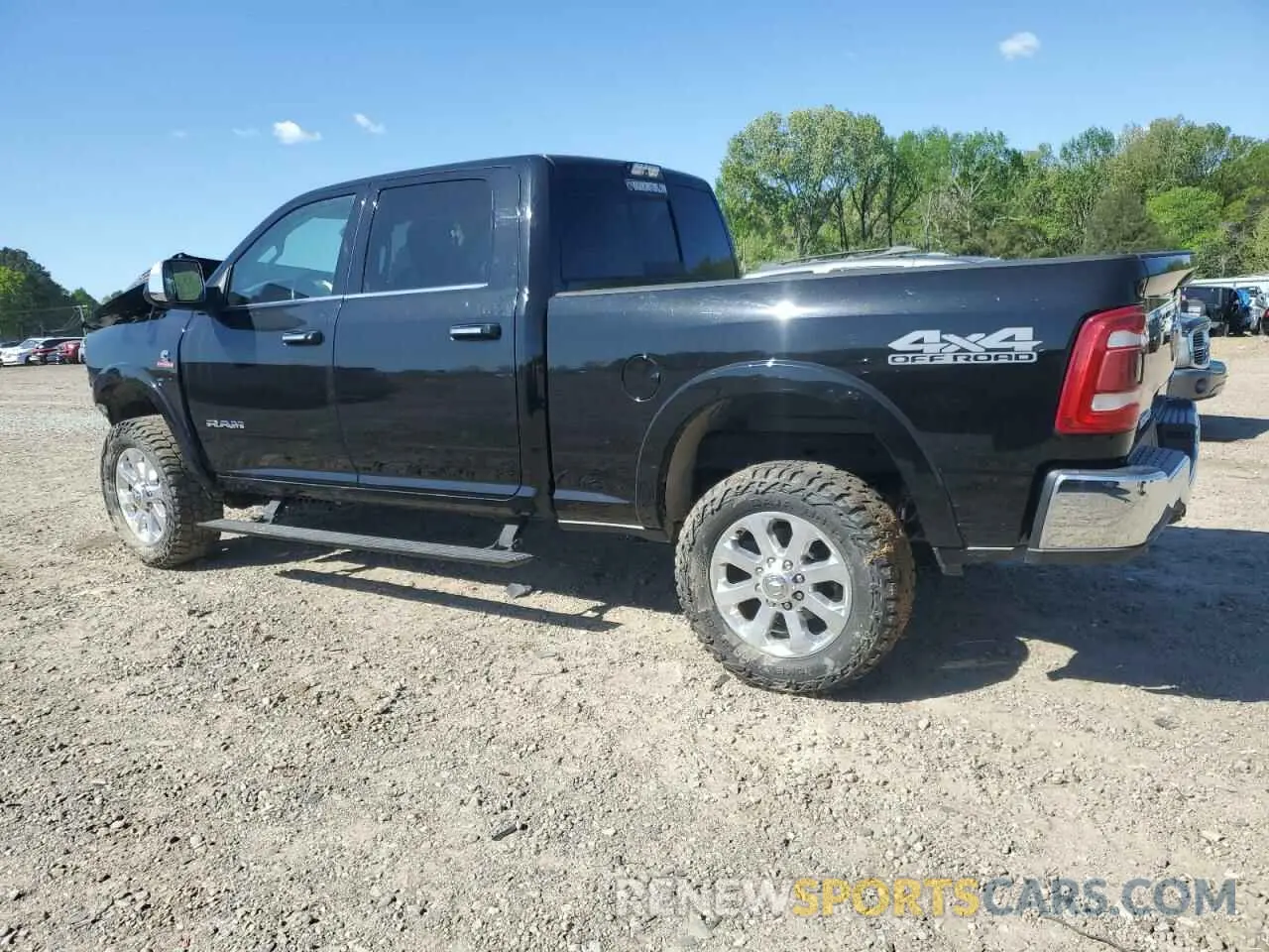 2 Photograph of a damaged car 3C6UR5FL5LG259595 RAM 2500 2020