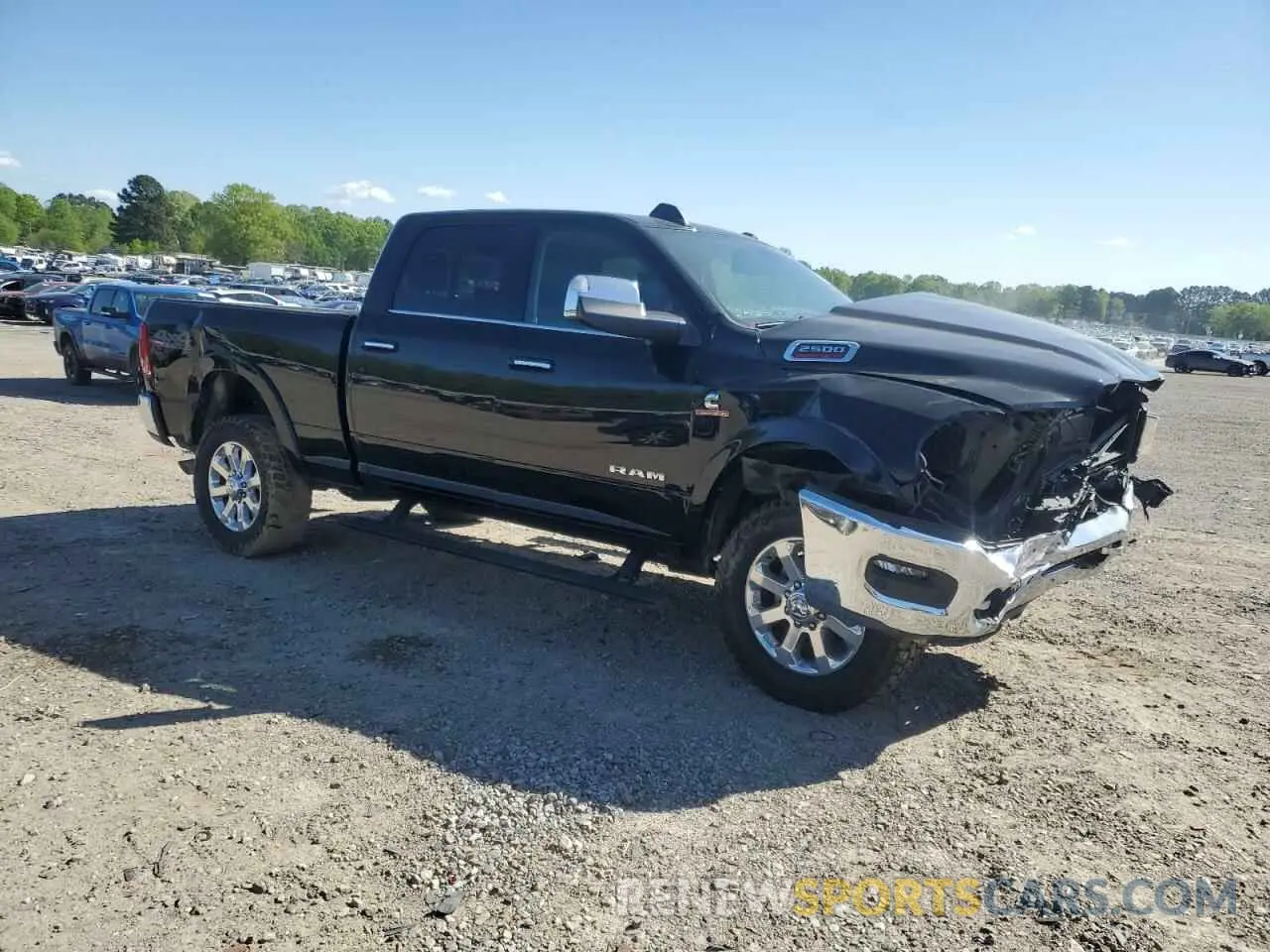 4 Photograph of a damaged car 3C6UR5FL5LG259595 RAM 2500 2020