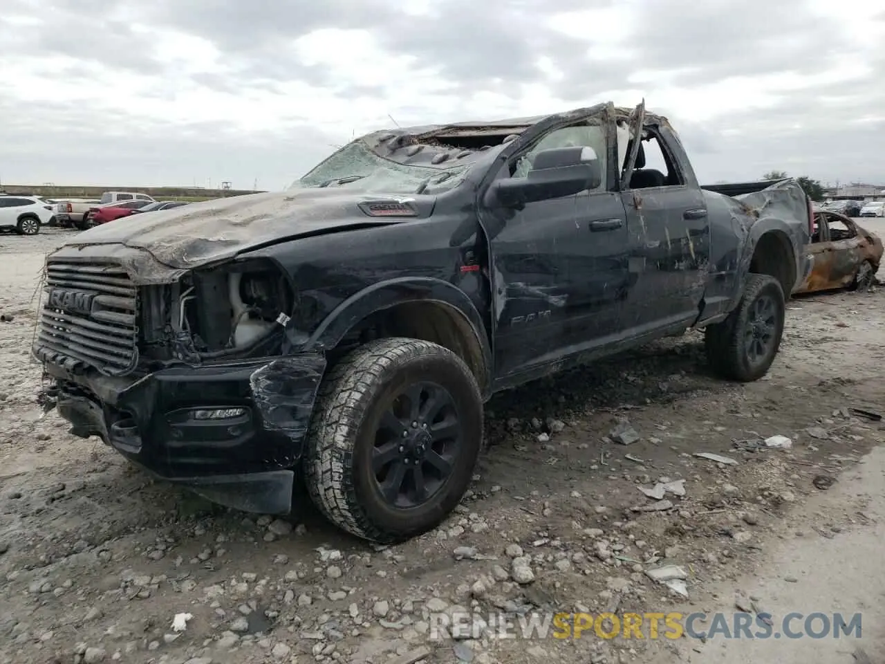 1 Photograph of a damaged car 3C6UR5FL5LG274937 RAM 2500 2020