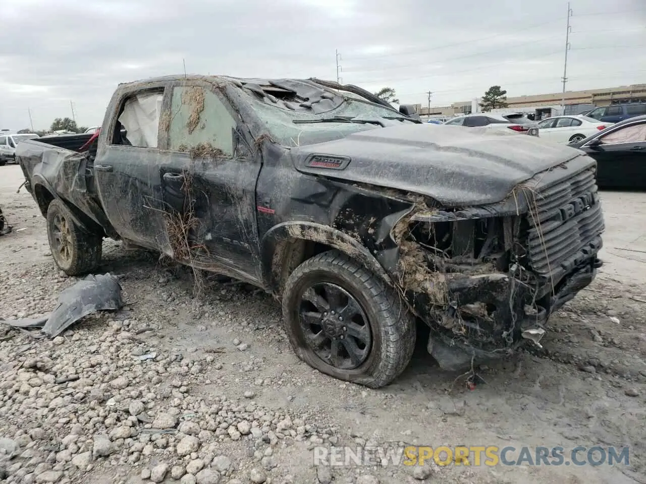 4 Photograph of a damaged car 3C6UR5FL5LG274937 RAM 2500 2020