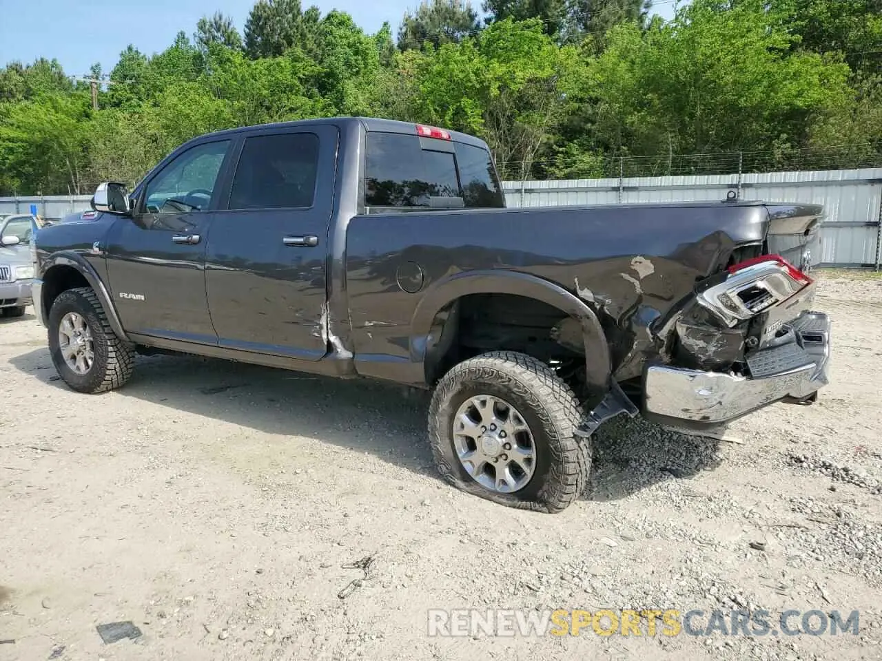 2 Photograph of a damaged car 3C6UR5FL6LG160087 RAM 2500 2020