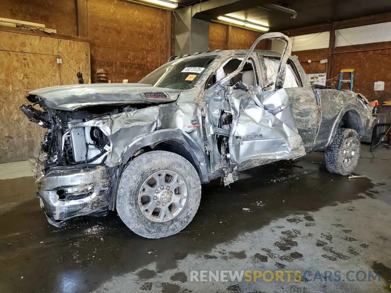 1 Photograph of a damaged car 3C6UR5FL7LG196466 RAM 2500 2020