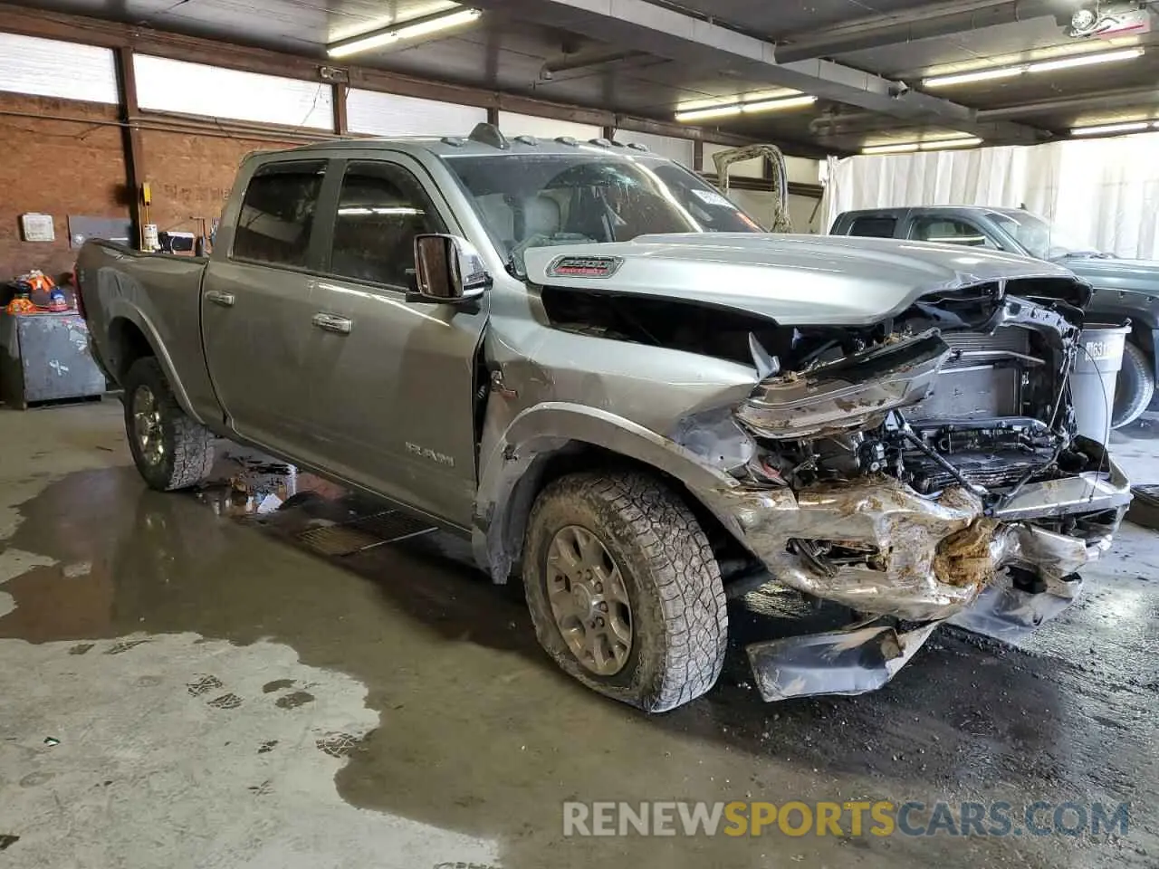 4 Photograph of a damaged car 3C6UR5FL7LG196466 RAM 2500 2020