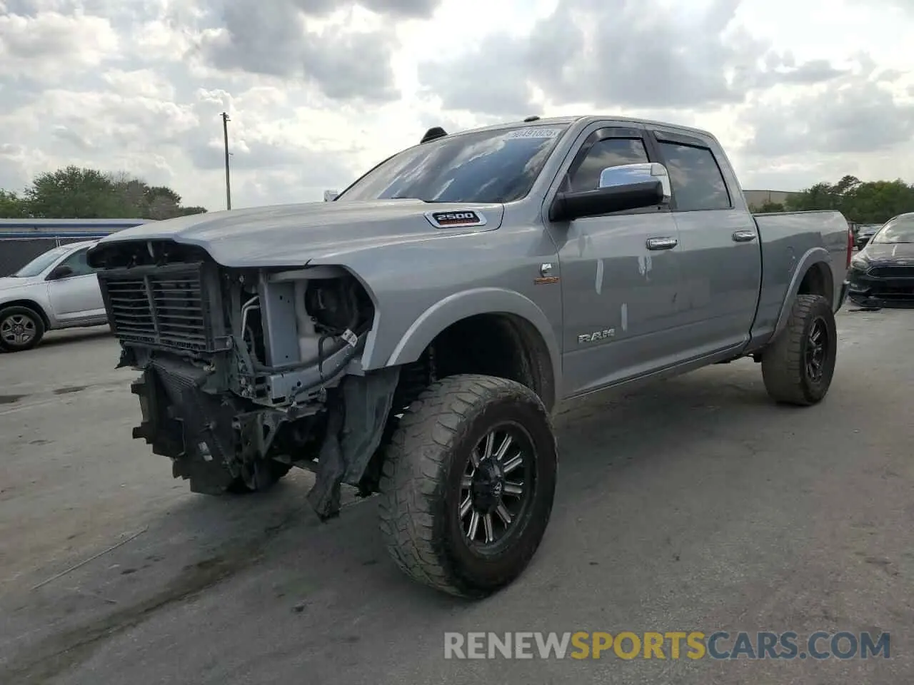 1 Photograph of a damaged car 3C6UR5FLXLG266753 RAM 2500 2020