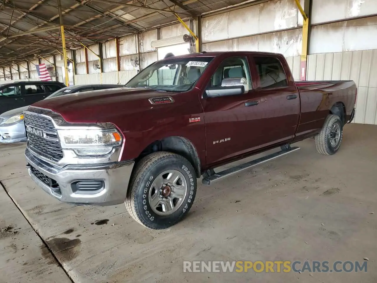1 Photograph of a damaged car 3C6UR5HJ1LG124979 RAM 2500 2020